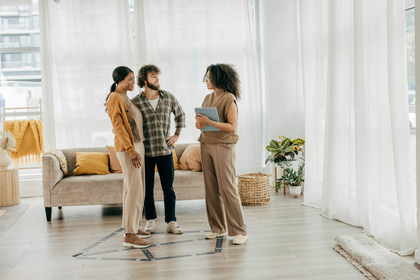 Meeting with real estate agent, couple buying a condo.