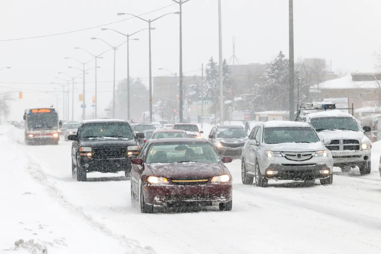 Cars on a wintery road - safe winter driving tips
